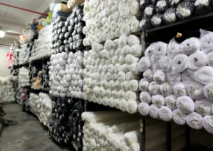 Bulk fabric roll storage wall