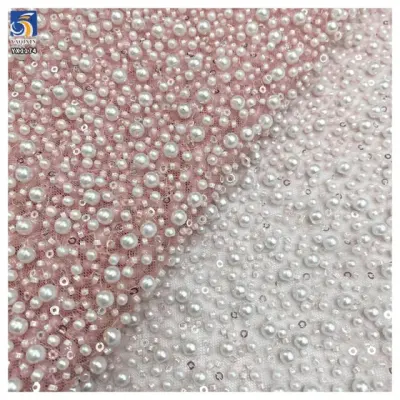 White pearl beaded lace close-up