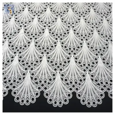 White eyelet embroidery lace close-up