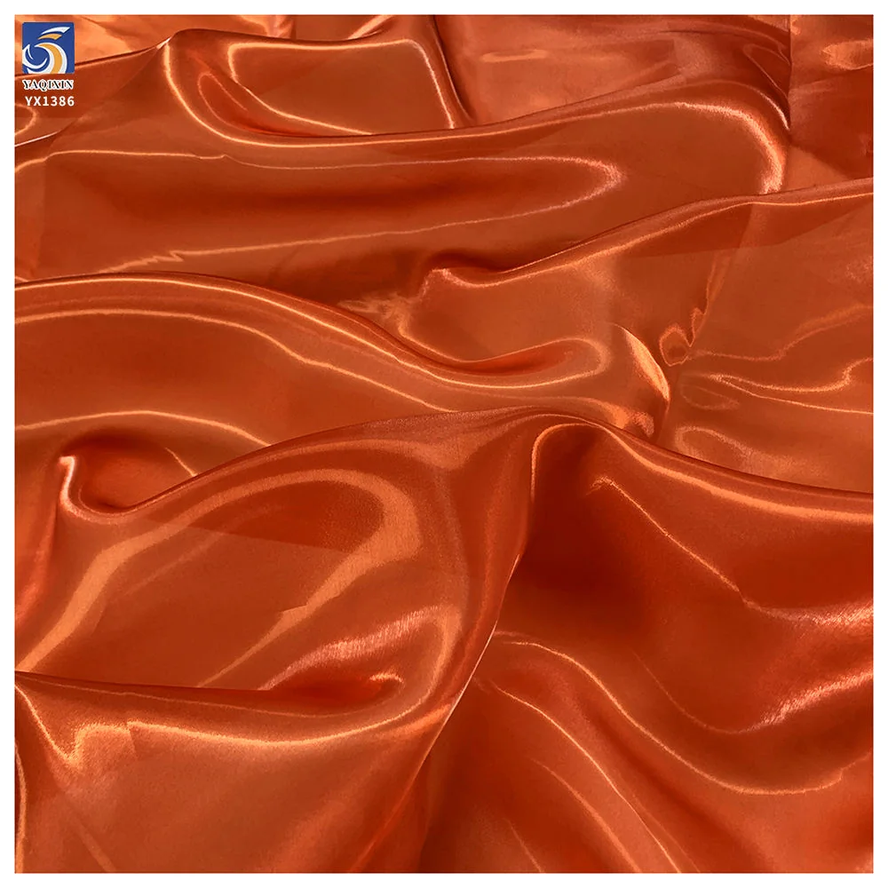 YX581-2 shimmer liquid organza fabric surface texture