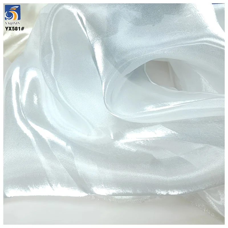 YX581-2 liquid organza fabric fold detail