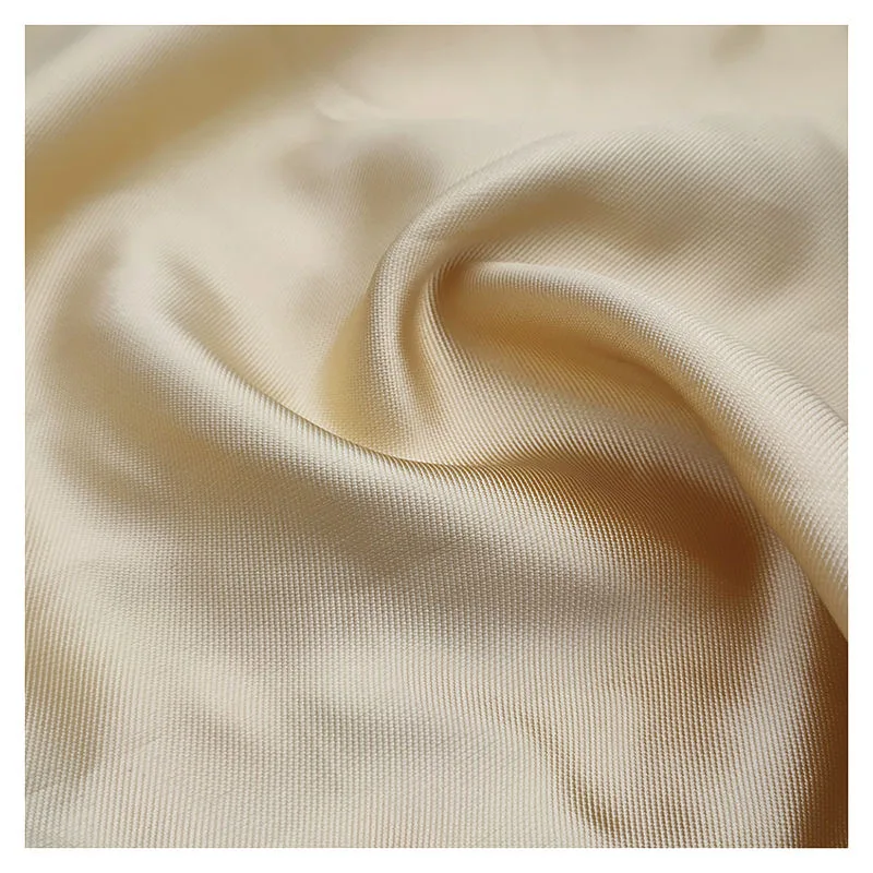 Champagne ivory mikado satin close-up