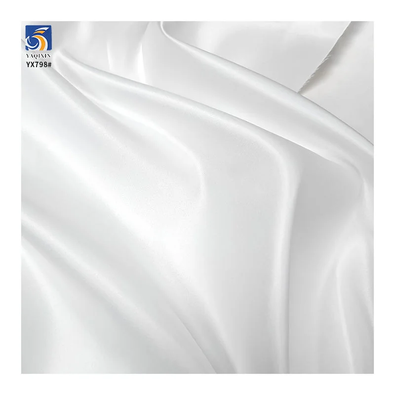 Close-up texture of YX693-2 160gsm white matte satin fabric showing its smooth woven surface